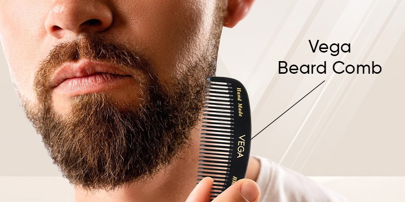 A man holding Vega Beard Trimmer
