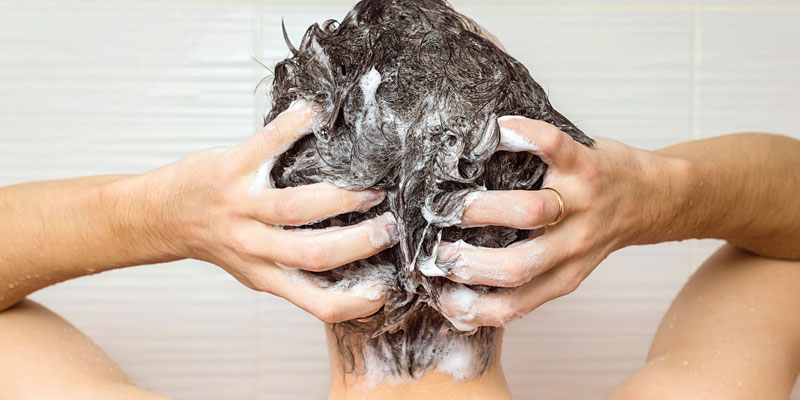 Man-washing-his-hairtaking-a-shower-washing-his-hair