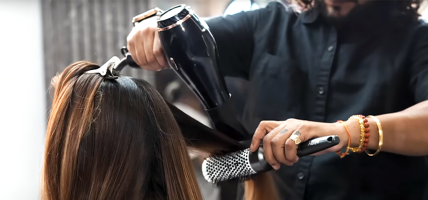 Using-hot-curl-brush-with-dryer