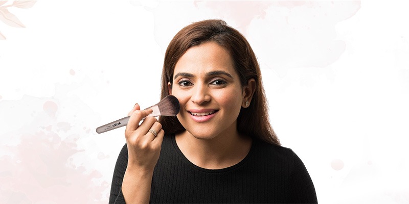 Women using Vega Hair Brush