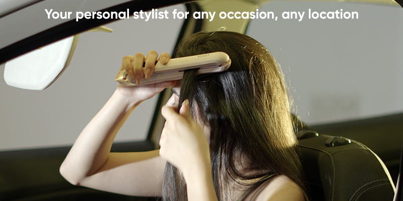 Woman-Using- cordless-hair-straightener