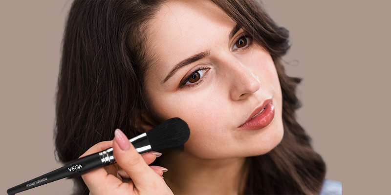 Women-Using-Powder-Brush