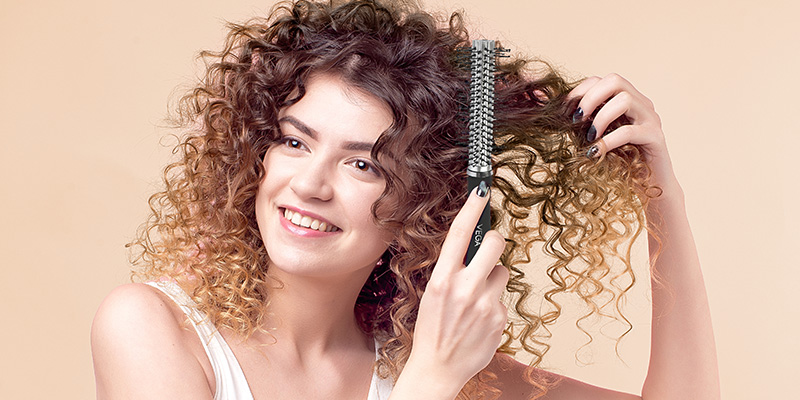 Women-Using-Round-Hair-Brush